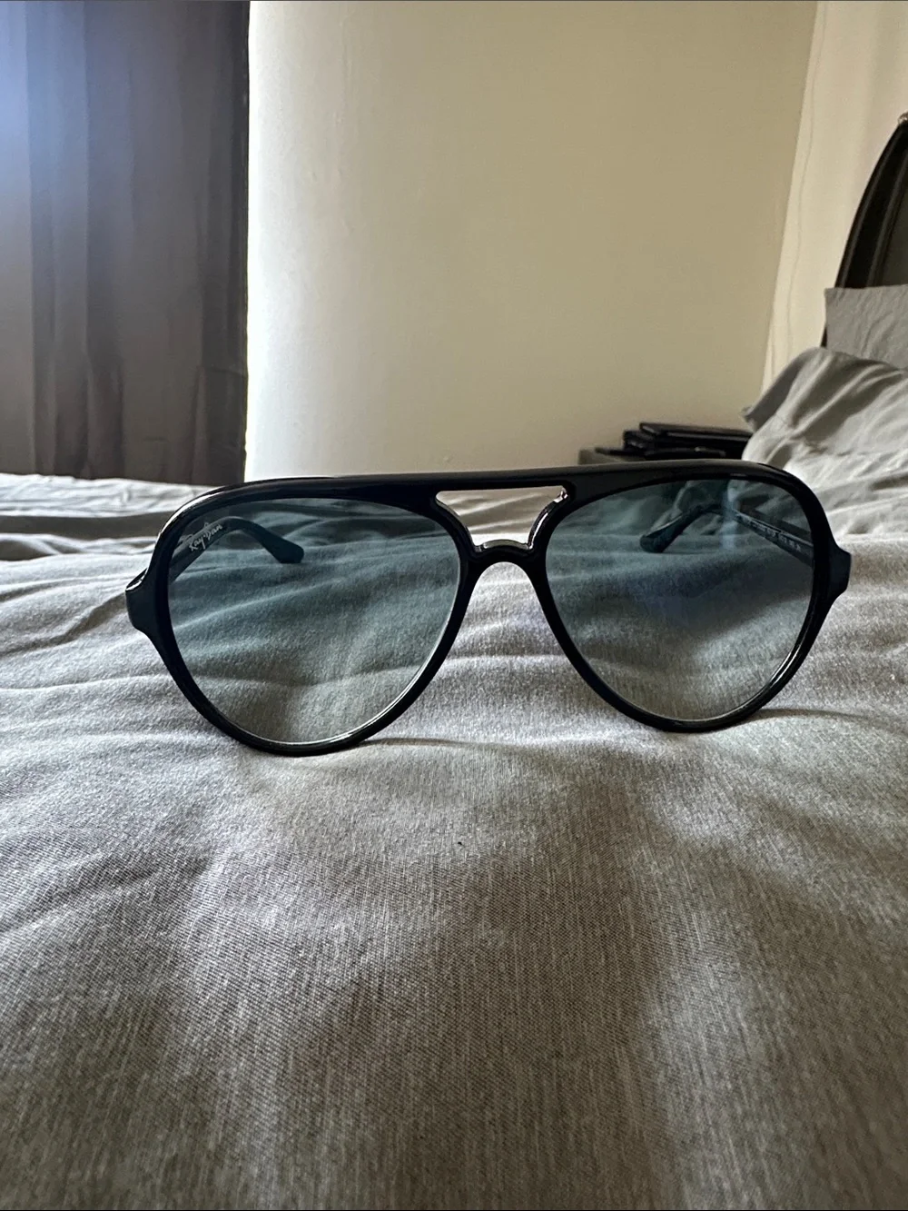 Ray-Ban Black Frame Sunglasses with Blue Tinted Lenses